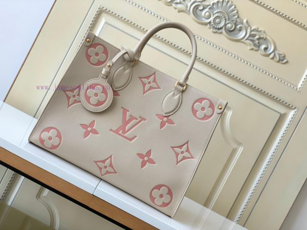 Home Photography M21575This OnTheGo medium-sized handbag exudes the elegant charm of Monogra yr88f14o