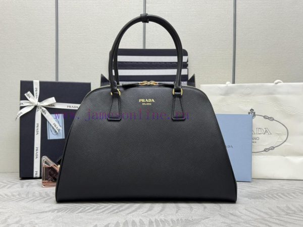 This exquisite handbag is made of Saffiano leather and features a shoulder and back handbag sqouoyrp